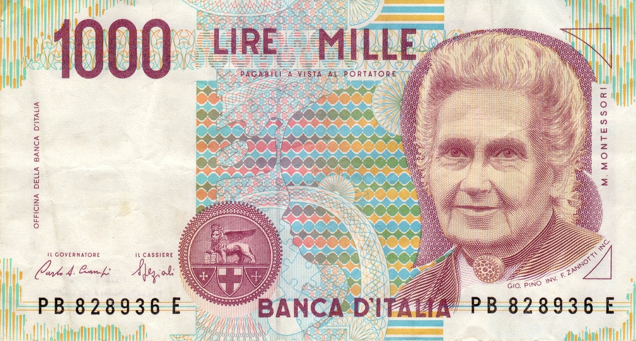 Banconota da 500.000 Lire di Raffaello su sfondo bianco, simbolo di valore collezionistico e storicità.